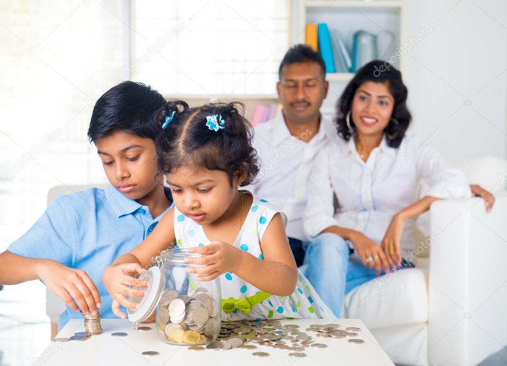 Indian parents teaching children — Stock Photo © yuliang11 ...