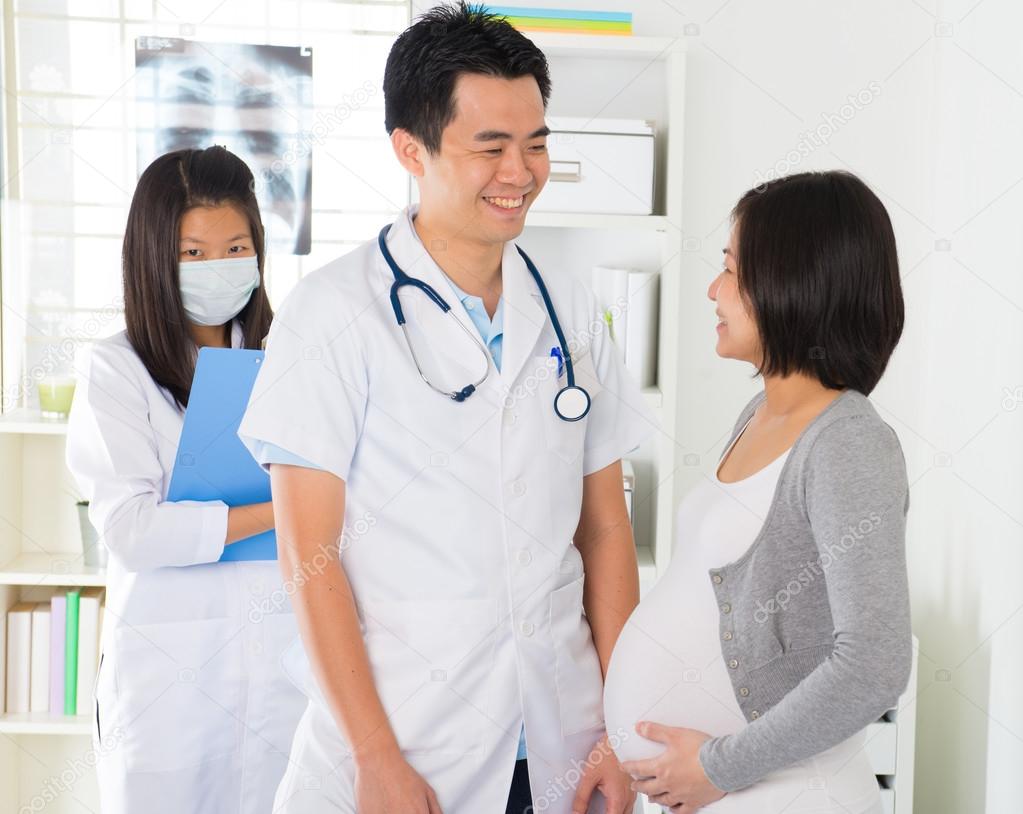 Asian pregnancy  with doctor