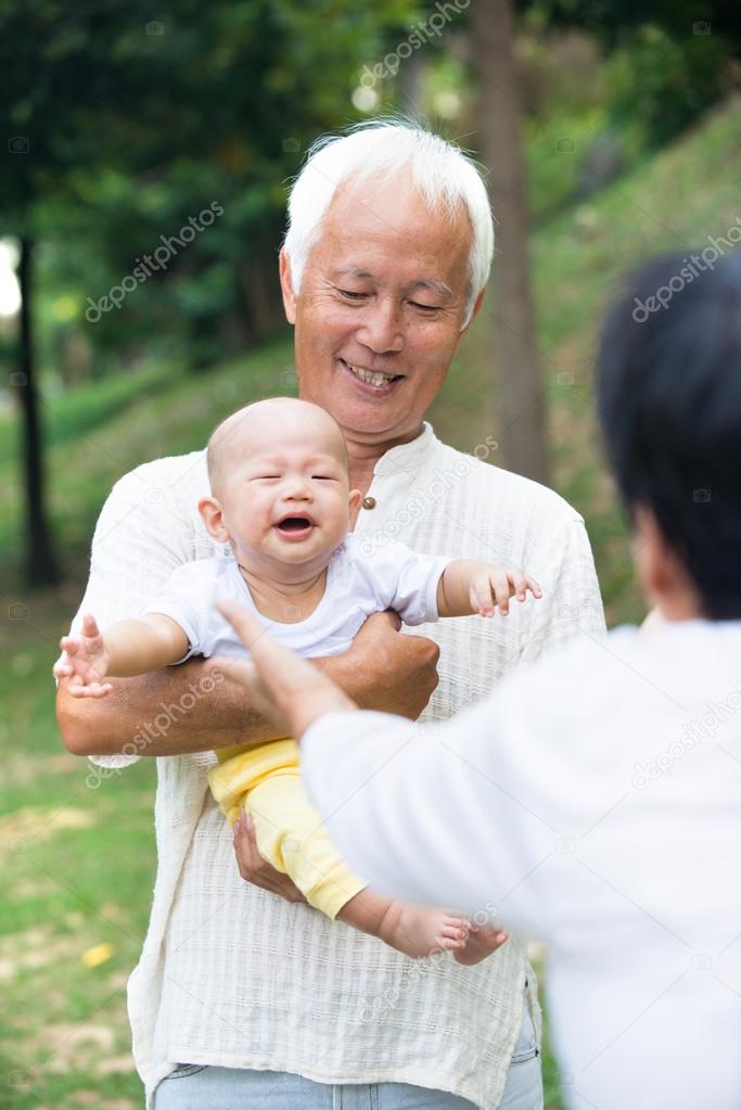 Asian baby with grandparents