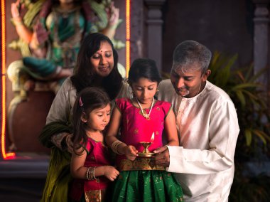 Indian family celebrating diwali clipart