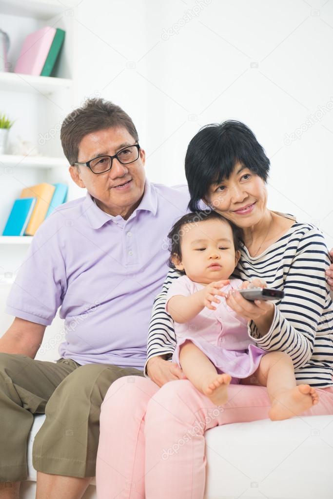 Grand parents with grand daughter