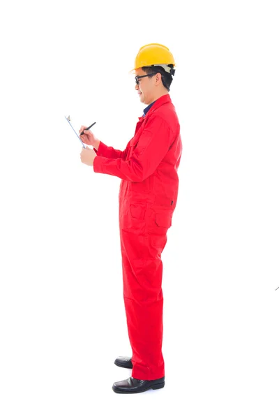 Asian male engineer doing report — Stock Photo, Image
