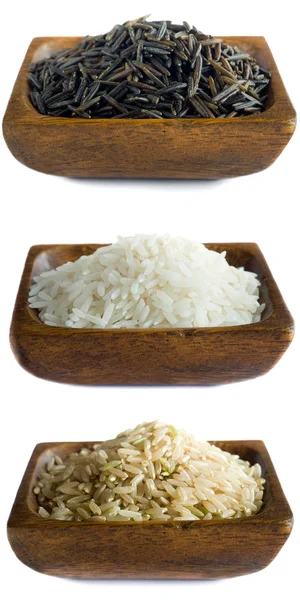 Uncooked rice in bowls — Stock Photo, Image