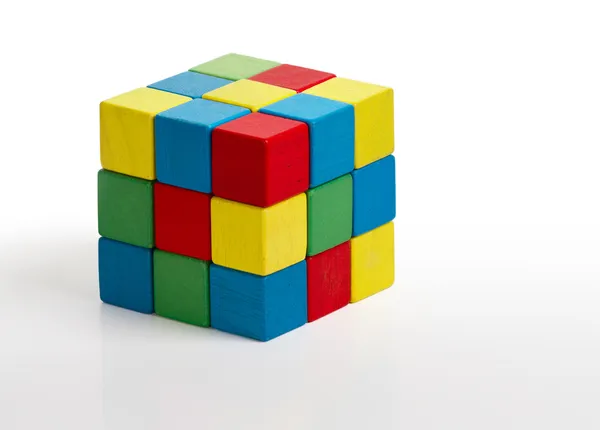 Jigsaw puzzle rubik cube toy, multicolor wooden colorful game pieces — Stock Photo, Image