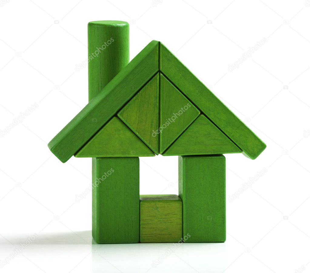Green house, energy efficiency home save heat and ecology. Toy blocks isolated white background