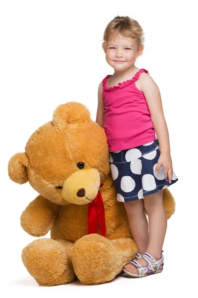 Little girl with a toy — Stock Photo, Image