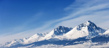 Dramatic peaks pinnacles snowy summits high altitude mountain pa clipart
