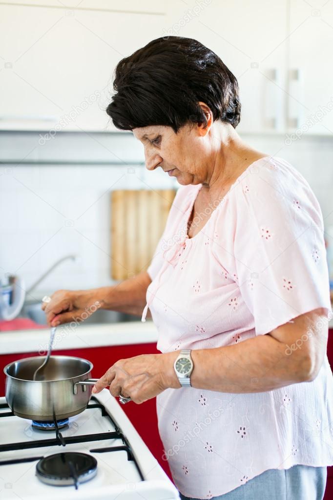 Senior woman preparing food