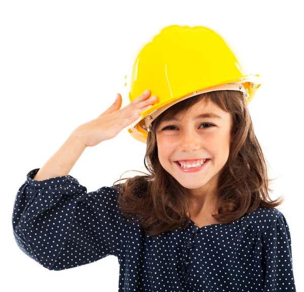 Menina vestindo capacete amarelo saudação — Fotografia de Stock