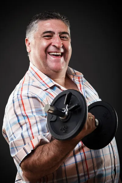 Hombre gordo feliz con mancuerna — Foto de Stock