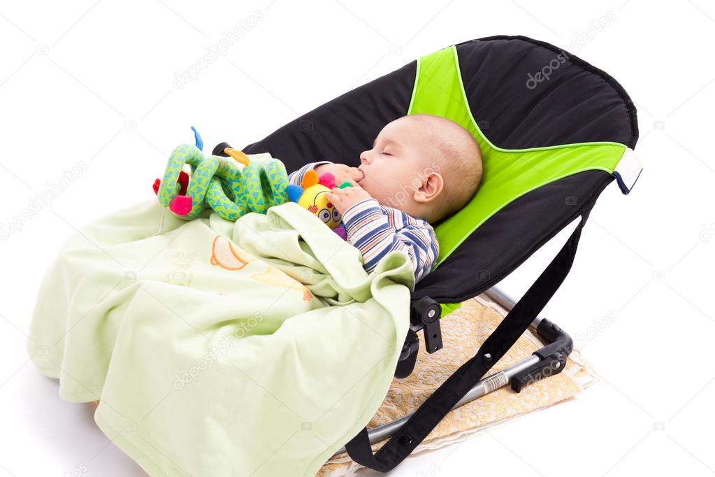Toddler sleeping in a baby lounger