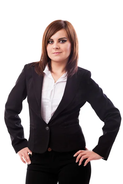 Businesswoman standing with hands on hips — Stock Photo, Image