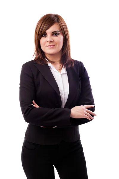 Beautiful businesswoman standing with crossed arms — Stock Photo, Image