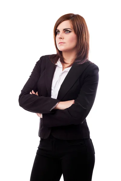 Beautiful businesswoman standing with crossed arms — Stock Photo, Image