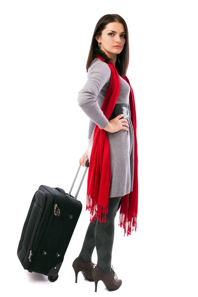 Young traveler woman holding a luggage — Stok fotoğraf