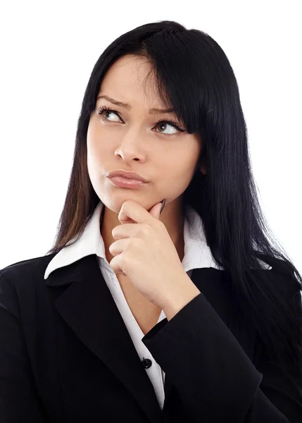 Closeup of attractive businesswoman thinking and looking at the Royalty Free Stock Images