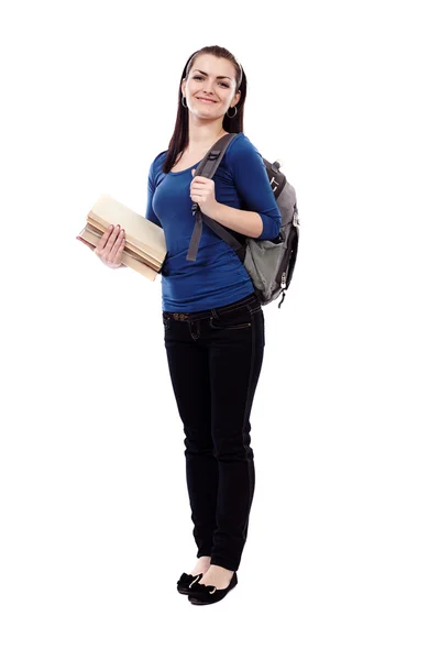 Estudante menina com mochila e livros — Fotografia de Stock