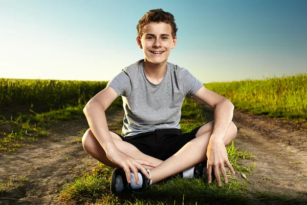 Teen on a countryside road — Stok fotoğraf