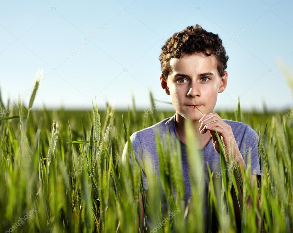 Teenager in a wheat field