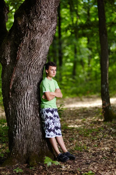 Teenager in the forest — Stock Photo, Image