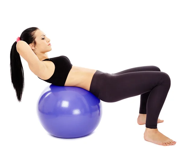 Sporty girl doing abs — Stock Photo, Image