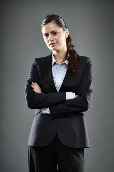 Businesswoman with arms folded — Stock Photo, Image