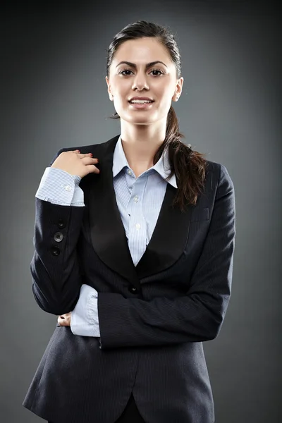 Mujer de negocios positiva sonriendo — Foto de Stock