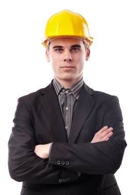 silah katlanmış giyen kask ile genç bir mühendis