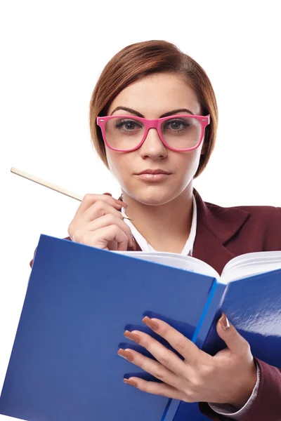 Severe teacher cheching the class book — Stock Photo, Image