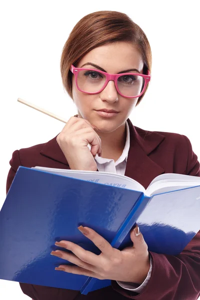 Professora severa checando o livro de aula — Fotografia de Stock