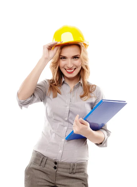 Inženýr veselá žena nosit ochranou helmu a drží — Stock fotografie