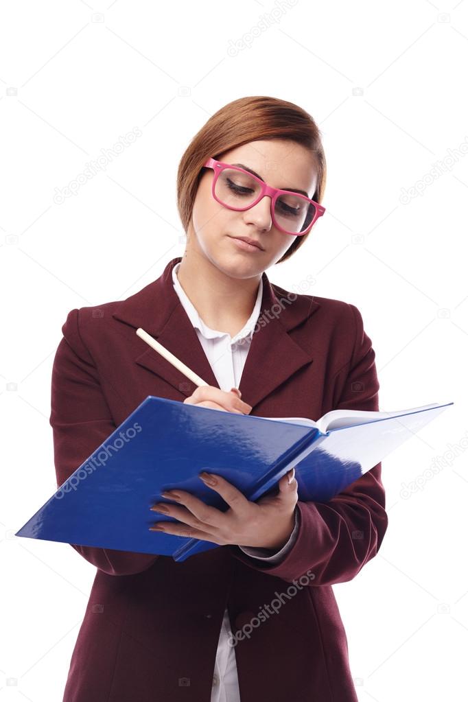 Severe teacher cheching the class book