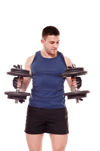 Hombre guapo haciendo ejercicio con pesas —  Fotos de Stock