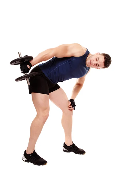 Handsome man working with heavy dumbbells — Stock Photo, Image