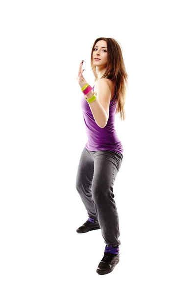 Młoda kobieta lekkoatletycznego robi taniec porusza — Zdjęcie stockowe