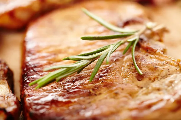 Fried pork chop decorated with rosemary — Stock Photo, Image