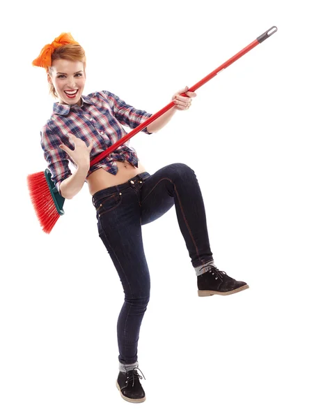 Cheerful housewife playing the broom — Stock Photo, Image