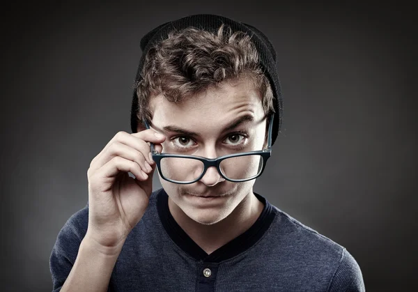 Handsome teenager wearing trendy cap and glasses — Stock Photo, Image