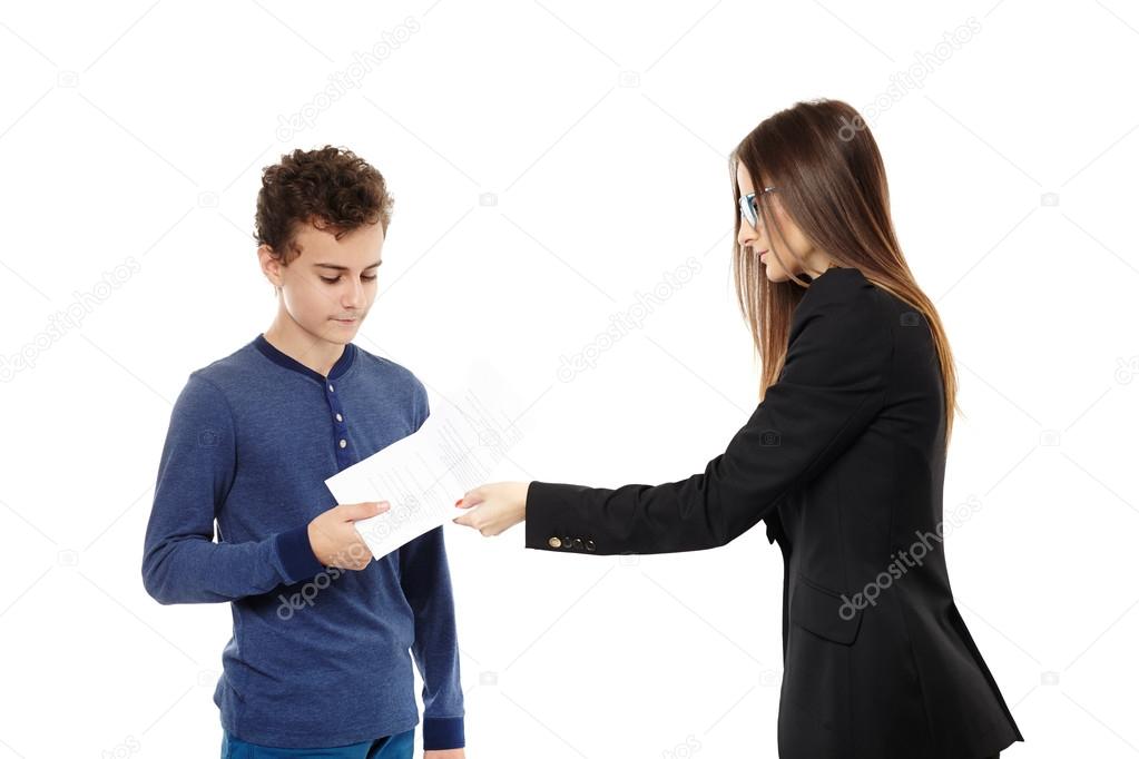 Teacher giving the student the test paper results