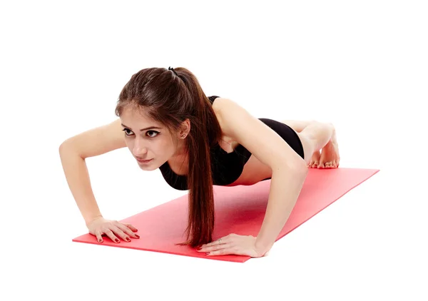 Athletic woman doing pushups — Stock Photo, Image