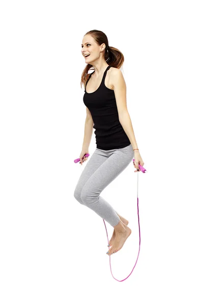 Young woman with the jump rope — Stock Photo, Image