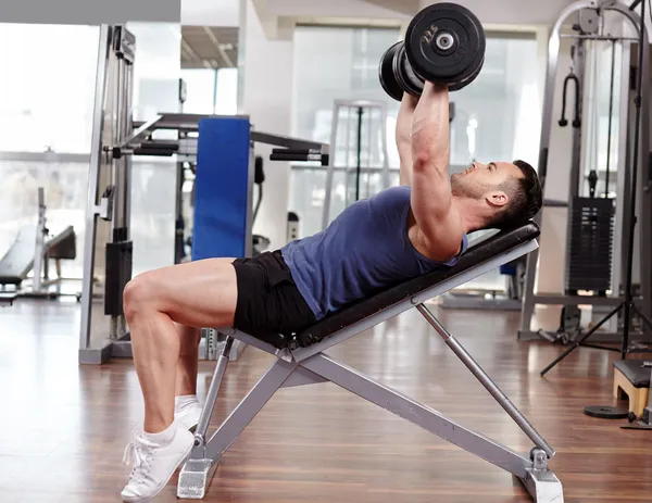 Chest workout on bench press — Stock Photo, Image