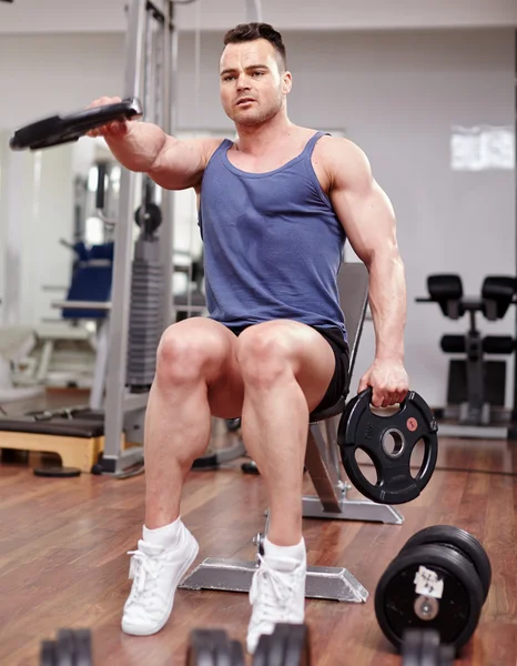 Man working with dumbbells — Stock Photo, Image