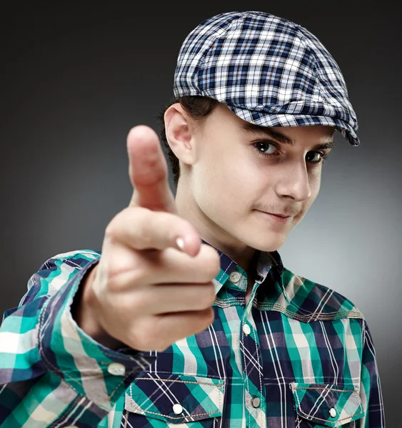 Teenage boy pointing at camera — Stock Photo, Image