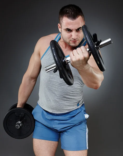 Training with dumbbells — Stock Photo, Image