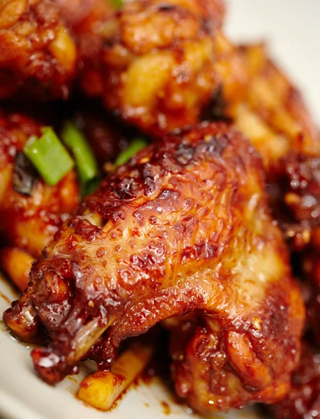Caramelized chicken wings — Stock Photo, Image