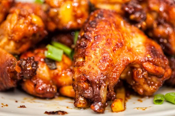 Caramelized chicken wings — Stock Photo, Image