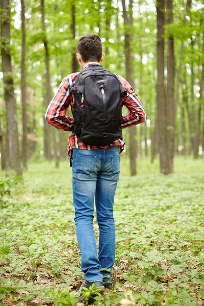 Хлопчик-підліток зі шкільною сумкою Ліцензійні Стокові Фото