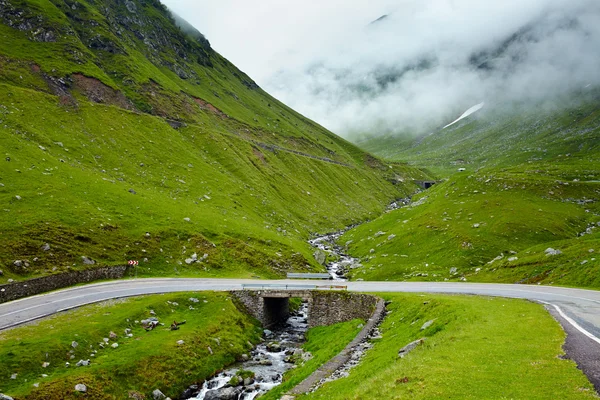 Winding road in mountains — Stock Photo, Image