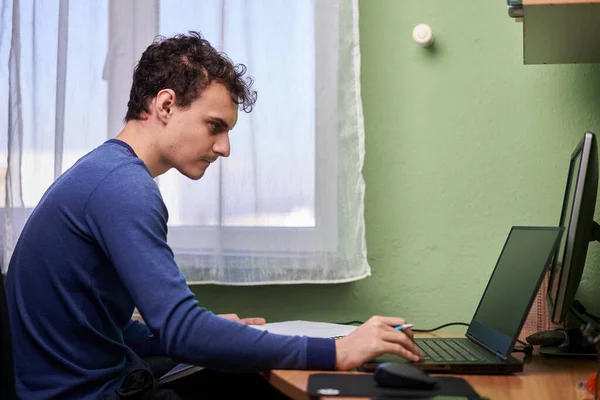 Software Developer Student Working Home Laptop Computer Cellphone Notebook His — Fotografia de Stock